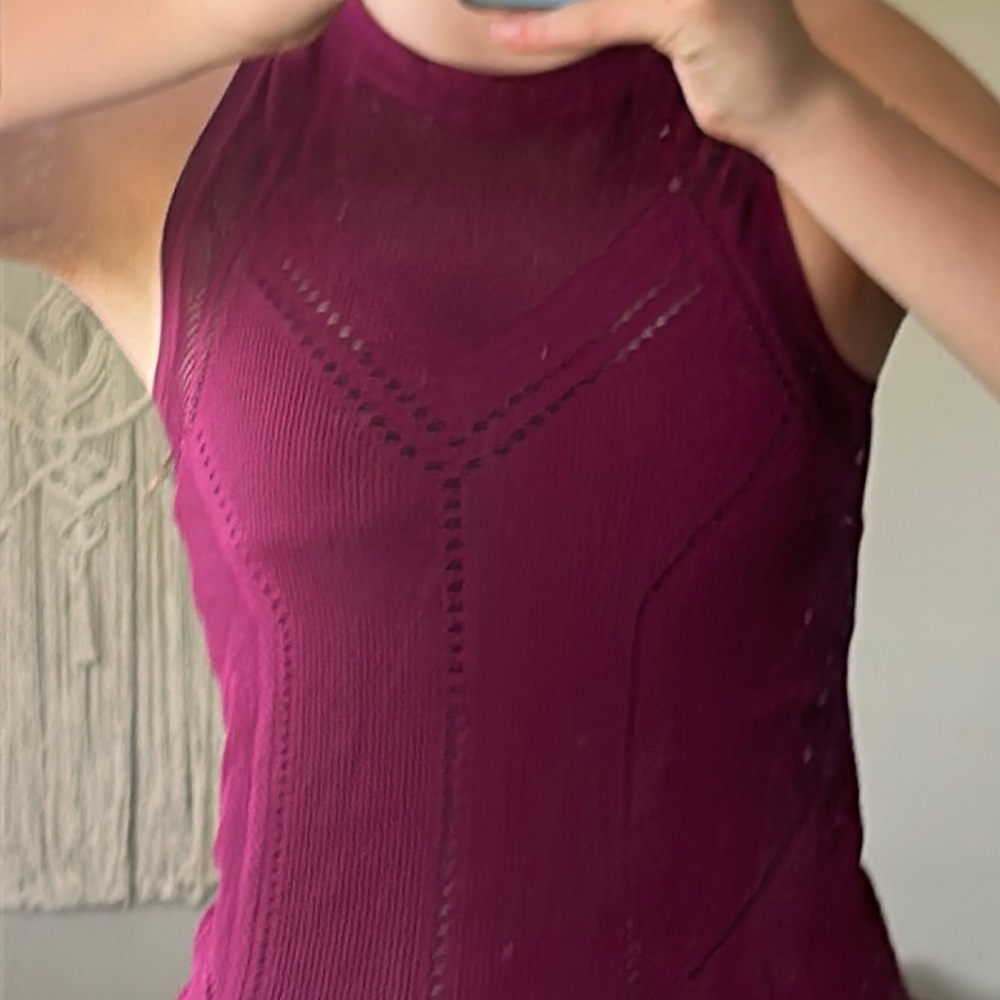 Purple Athleta seamless lasercut tank.